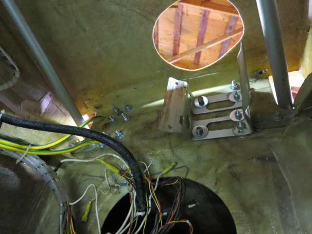 The oil tank bracket mounted inside the fuse. Very hard to get to.