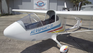 9027M, the crashed plane that was to provide many of the parts for this conversion. Here with the cutoff canopy, for summer flying.